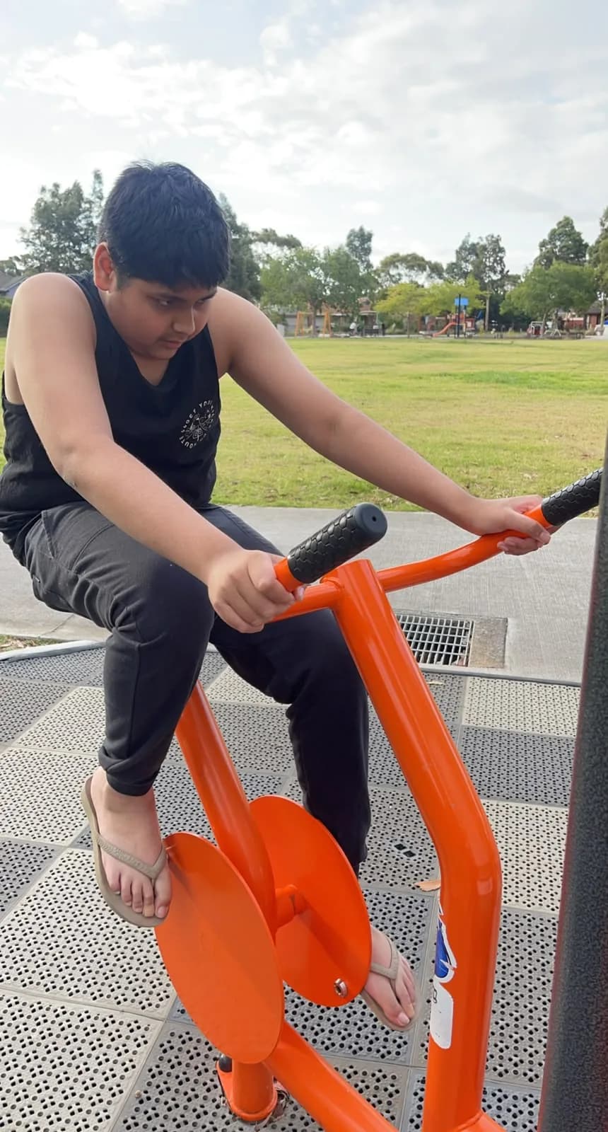 JS Choice participant using outdoor exercise equipment